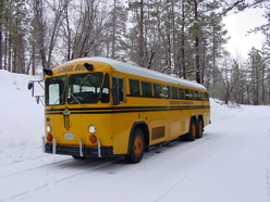 Old School Bus parked in the snow